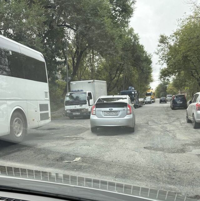 Аварийный участок: дорога между Днепровской и ТОВВМУ превратилась в полосу препятствий - PRIMPRESS, 13.09.2025
